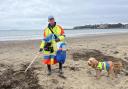 Brian Hallworth litter picking on Weymouth Beach