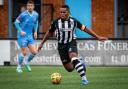 Jordan Ngalo will stay at Dorchester Town for a third season