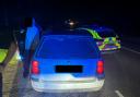 Dorset Police stopping a car as they increase their patrols to counter poaching and rural crimes