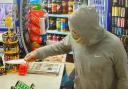 Staff and customers 'shaken' after knifepoint robbery