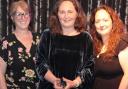 Dorset Council foster carer, Jo Wheeler (centre of image), collects the Pioneer award in recognition for her incredible work helping Dorset's children and young people.