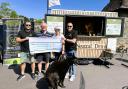 BaDCO receiving their cheque after the fundraiser