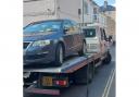 A 'suspicious' car had been blocking New Street in Weymouth and was seized by police officers