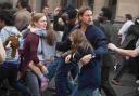 BRAAAINS: Brad Pitt uses brain power to fight a pandemic in World War Z.