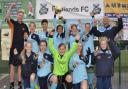 TOP SPOT: Redlands Girls Under-13s celebrate their success