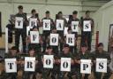 SIGNING UP: TA soldiers from Corunna Company 6th Battalion Rifles show their support for our shoebox campaign