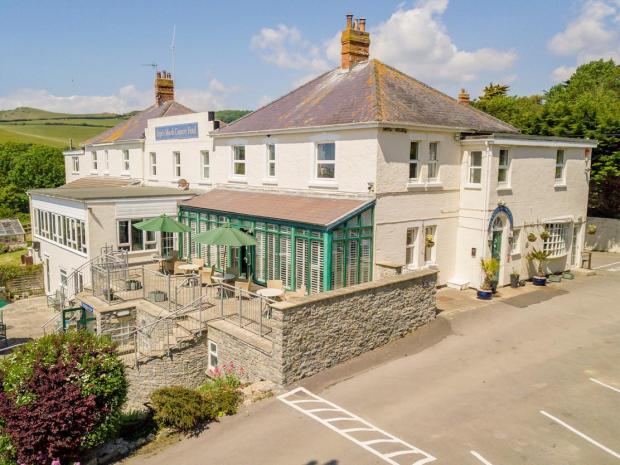 Dorset Echo: Eype's Mouth County Hotel, based in Eype near Bridport, has been put up for sale for £1.25 million. Picture: Christie & Co