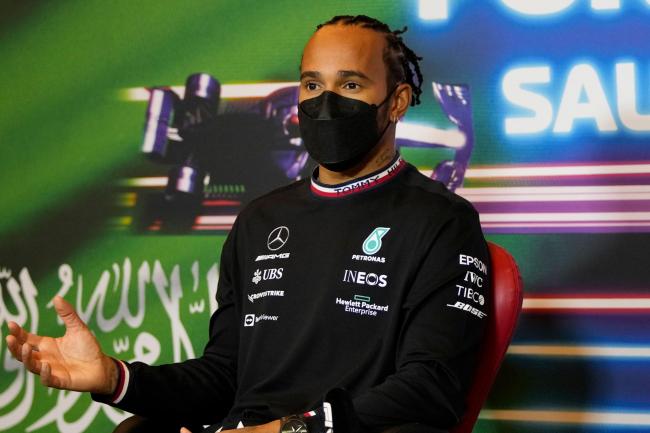 Lewis Hamilton speaks during a press conference