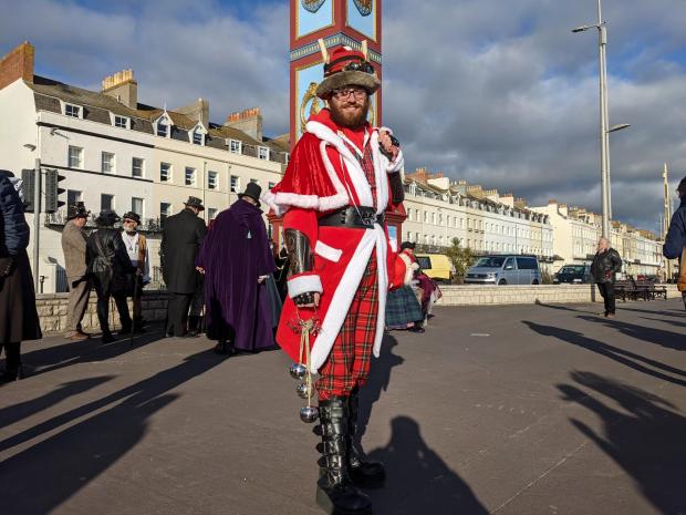 Dorset Echo: Crowds join in the walk along the prom as part of Steampunk Weymouth. Picture: Sam Machin