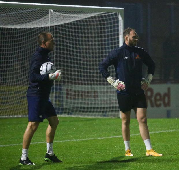 Dorset Echo: Jason Matthews, left, will continue at Weymouth in his role as goalkeeping coach Picture: MARK PROBIN