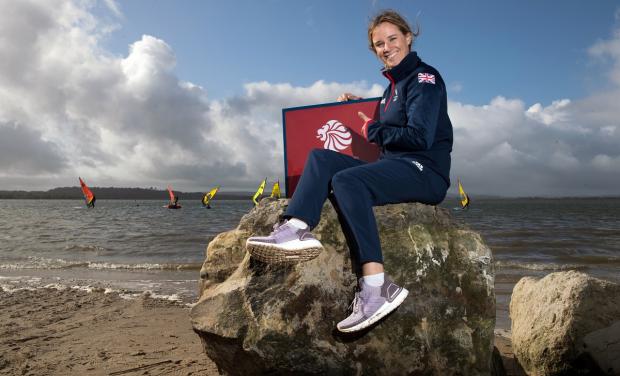 Dorset Echo: Sailing gold-medallist Hannah Mills awarded an OBE. Picture: PA