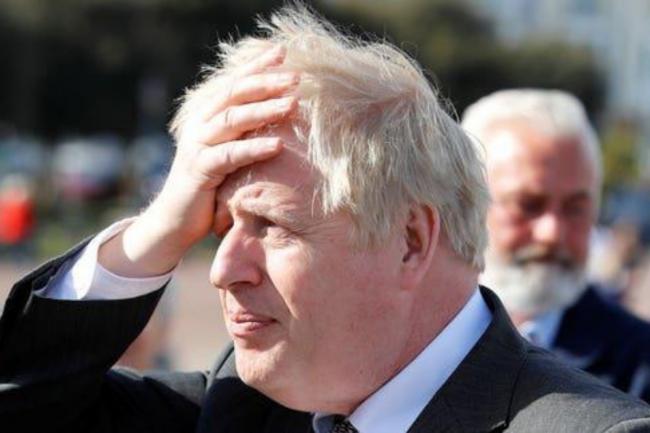 'Boris Johnson should resign over Christmas party scancal' (PA)
