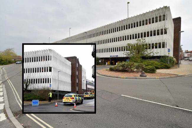 A road closure was put in place while emergency services worked to bring a woman to safety at Weymouth's multi-storey car park - where there has been a succession of concern for welfare incidents. Inset shows previous incident at the building