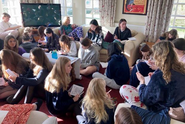 Dorset Echo: Bryanston pupils gathered together to prepare personal messages for Ukrainian children,  picture: Bryanston School