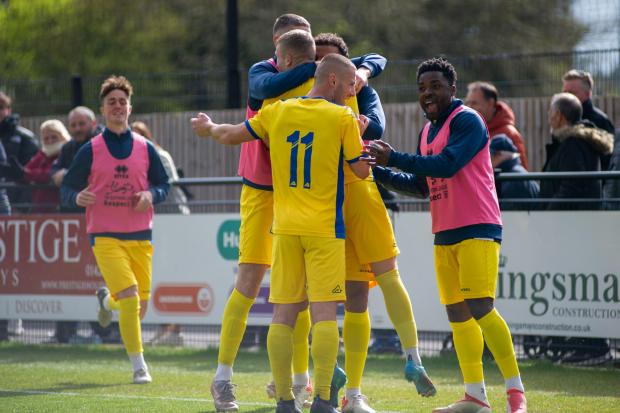 Dorchester celebrate what turned out to be their winner against Wimborne 				                Picture: DAVID PARTRIDGE