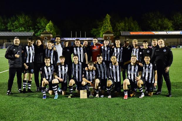 Dorchester Town Under-23s with the Hampshire Combination and Development Challenge Cup trophy Picture: GRAHAM HUNT PHOTOGRAPHY