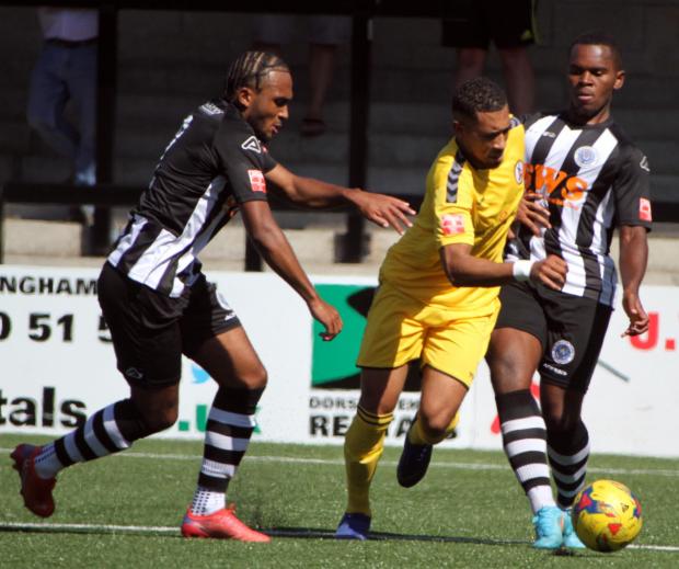 Dorset Echo: Jordan Ngalo, right, was among eight debutants in the starting XI Picture: IDRIS MARTIN