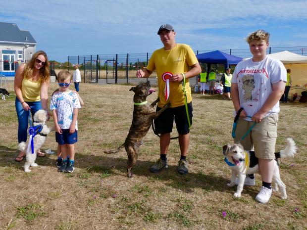 Dorset Echo: Some of the winners with their owners.  Photo: Rotary Club of Portland