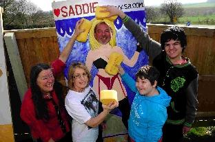 Student paid 20p a throw to lob a wet sponge at Dorchester Learning Centre's head John Taylor and deputy head Clare Alexander.