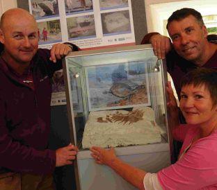 Albion Stone production manager Richard Mort, quarry manager Mark Godden and Diane Godden who spotted the turtle