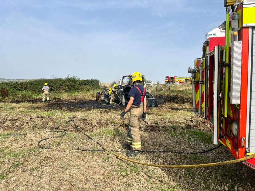 Large fire as tractor ablaze at farm at Portesham Dairy Farm 
