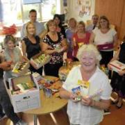 TONIC FOR THE TROOPS:  Dorset Echo staff with Molly Rennie packing boxes for troops in Afghanistan