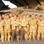 RAF personnel in Kandahar say thanks after receiving the latest batch of shoeboxes