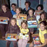 The 2nd Preston Brownie have been packing boxes for our servicemen serving in Afghanistan