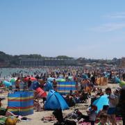 A busy Weymouth beach on a warm day