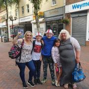 Family of England supporters in Weymouth town centre Picture: Bradley White