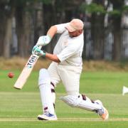 Dave Adkins scored a gritty 53 not out for Portland Red Triangle