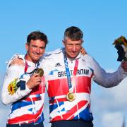 Portland pair Dylan Fletcher, left, and Stuart Bithell, right, took gold in the 49er class at Tokyo 2020 Picture: SAILING ENERGY/WORLD SAILING
