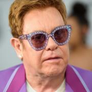 Elton John has postponed his farewell tour. Credit: PA