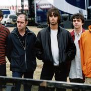 Oasis at the Knebworth concert in 1996 (PA Features Archive/Press Association Images)