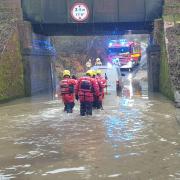 Van driver rescued from flood water by firefighters. Picture: Bridport Fire Station