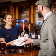 The pub chain Hungry Horse is giving away thousands of pairs of slippers with its Sunday roasts in April 10 (Hungry Horse)