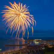 Fireworks light up the sky above the Cobb harbour at Lyme Regis for the Platinum Jubilee. - 5th June 2022.  Picture Credit: Graham Hunt Photography