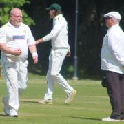 Dean Rogerson, left, took 4-15 against Puddletown 		            Picture: BARCUD-COCH PHOTOGRAPHY