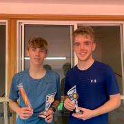 Dorchester under-18 boys winner Ethan Robinson, left, and runner-up Ed Keegan, right, with their trophies. Picture: AL CLARK