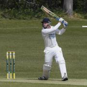 Tom Pope, normally a specialist batter, opened the bowling for Martinstown 	         Picture: GRAHAM HUNT
