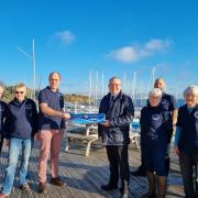Paul Knight (centre left) with members of Castle Cove Sailing Club