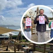 Celebrity chef Mark Hix (inset) is backing a petition to help retain an outdoor seating area at his Lyme Regis restaurant, The Oyster and Fish House
