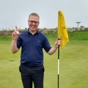 Chris Skinner celebrates after hitting a hole-in-one at Came Down