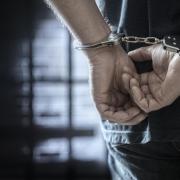 Man in handcuffs. Stock image