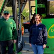 A 'valuable' Dorset bus service has returned for the summer to coincide with a BBC nature show being filmed nearby. Pictured: regular driver Gary Joynson, and Rachel Martin, Project Officer, RSPB.