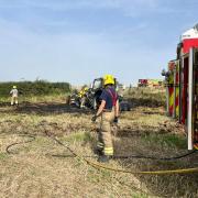 The fire service extinguished a tractor and mower blaze