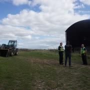 PC Sebastian Haggett and PCSO Chris Mullens visit a farmer in the Sixpenny Handley area