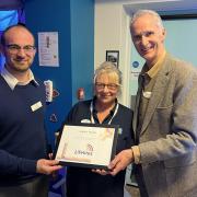 Rob Lightfoot CEO of Lifelites (left) with Julia's  House lead nurse Natalie Sheehy and CEO Martin Edwards