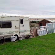 A caravan on the land to the side of Pirates Lane, Wyke Regis