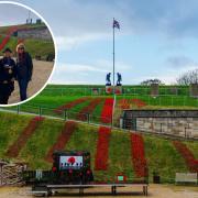 Mayor Cllr Kate Wheller opened a new poppy display at Nothe Fort. She is pictured with poppy display volunteers Jackie Waters and Tracey Chevis